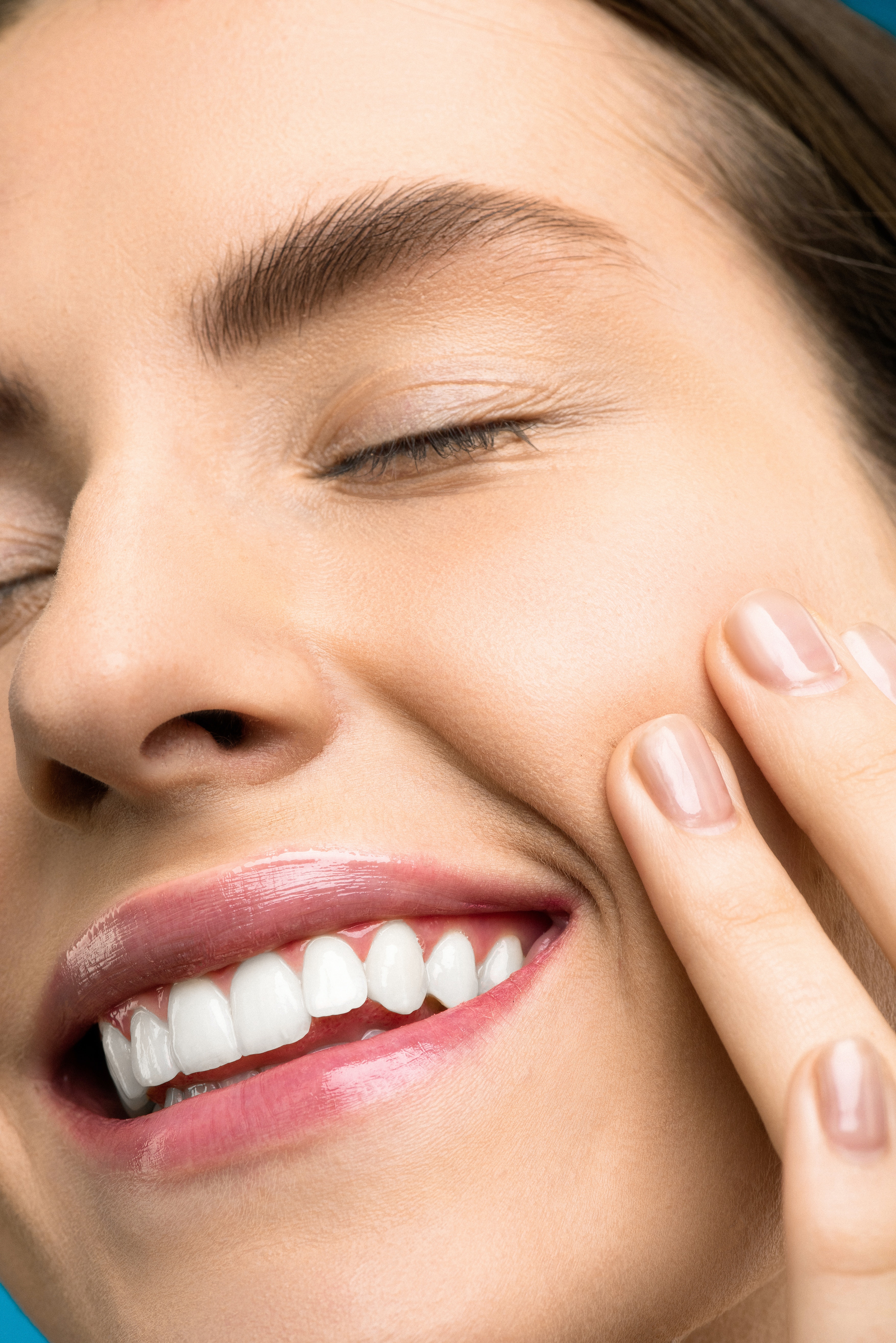 Woman smiling with beautiful teeth.